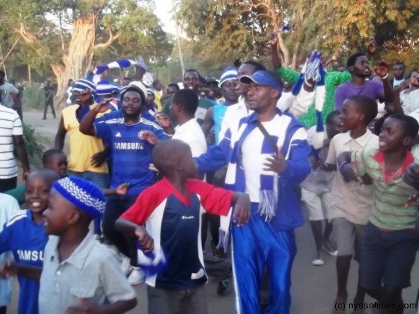 Who could blame them, Nomads supporters celebrating after the game. Photo by Elijah Phimbi, Nyasa Times