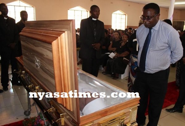 Wilkis Mijiga paying his last respect...Photo Jeromy Kadewere