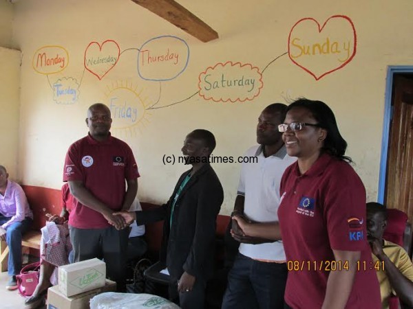 Wilson Moleni, James chirwa ,Moses Chimangeni .and Alice Abilu.. (deputy CEO OBM) from left to right.