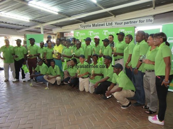 Winners pose for group photo with sponsors