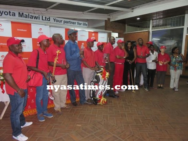 Winners pose with sponsors Airtel Malawi