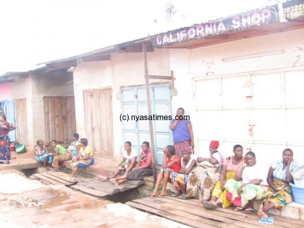 Women  outside the Karonga market waiting for officials to open the trading center