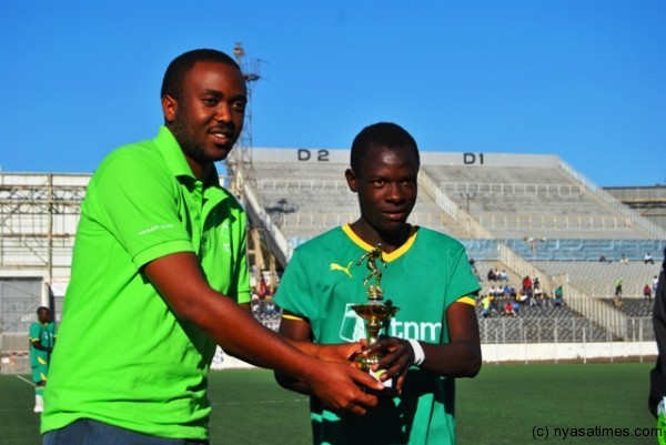 Wongani Zulu receiving his player of the month of july award....Photo Jeromy Kadewere