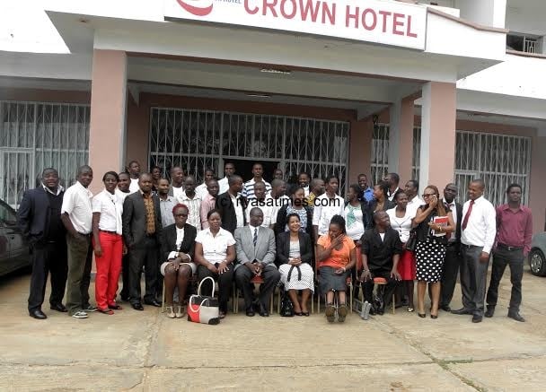 Youth participants pose for a group photo with Dr Sharra and other officials- Pic Lucky Mkandawire