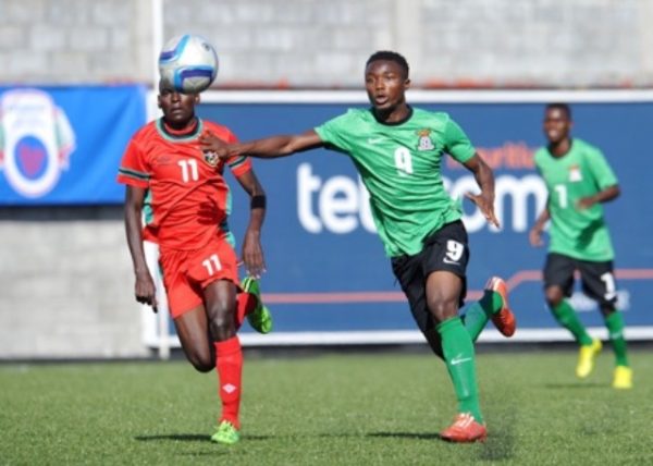 Damiano Kalo of Zambia challenged by Anthony Msisya of Malawi during the 2016 Cosafa Cup match between Zambia and Malawi at Saint Francois Xavie, Port Louis Mauritius on 24 July 2016. BackpagePix