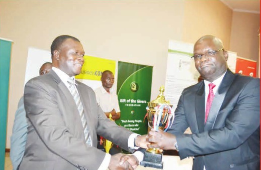 Times Group’s Editor in Chief George Kasakula receives media house of the year award – both electronic and print – from Petroleum Importers Limited general manager Enwell Kadango
