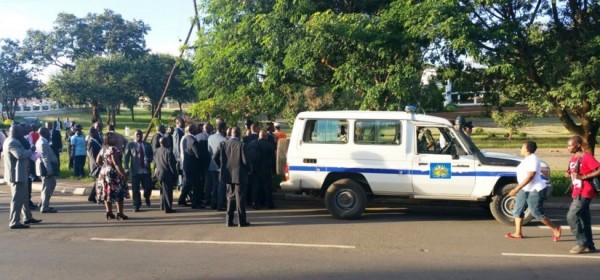 Members of Parliament trying to remove the police vehicle. Police mounted a roadblock before arresting Kabwila