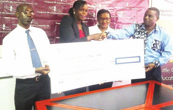 Vanguard Life presenting a dummy K250,000 cheque to Kachilika