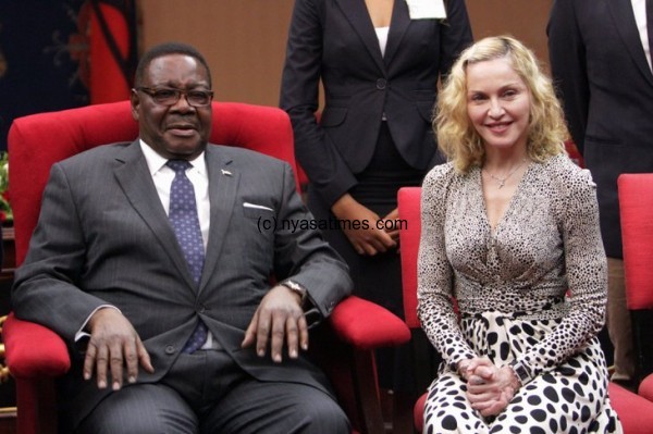 Madonna and Mutharika.- AP Photo/Tsvangirayi Mukwazhi)The Associated Press