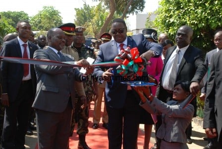 Mutharika cutting the ribbon to mark the official launch of this years Agriculture Trade Fair in Blantyre