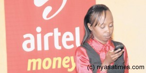 Customer using Airtel money transfer service