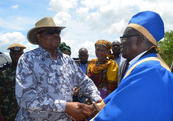 President Mutharika greets a chief during his tour of flood ravaged lower shire