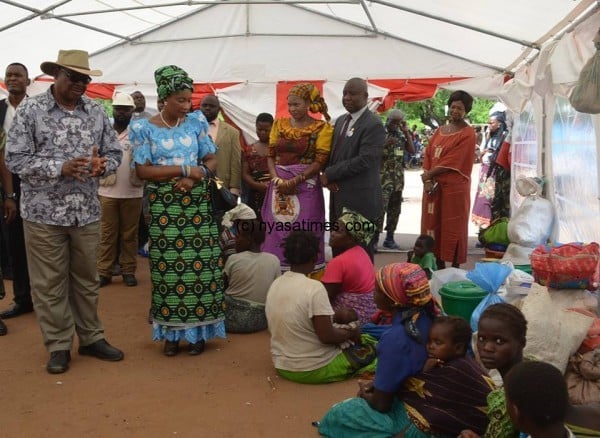 President Mutharika and First Lady assuring flood victims that his government would spare no effort to help them.