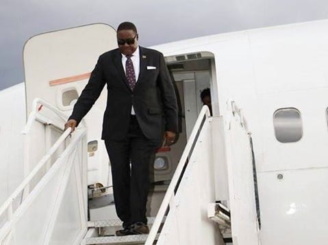 President Mutharika using a commercial flight