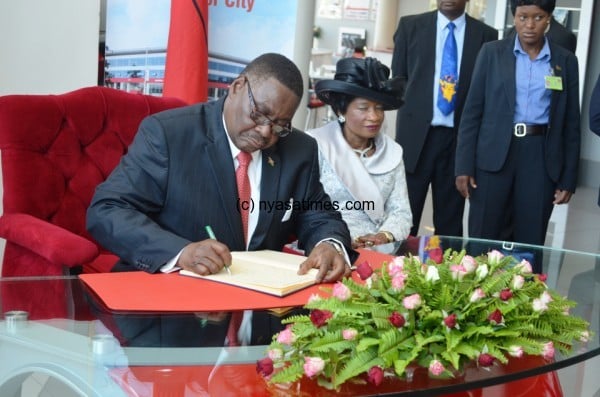 President Mutharika   signs 