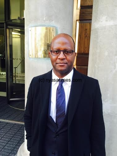 Muluzi outside DFID offices in London.-Photo by Thom Chiumia, Nyasa Times