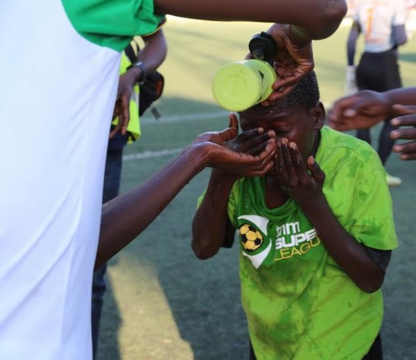 A ball boy was not spared from the teargas smoke...Photo Jeromy Kadewere
