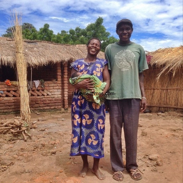 Mum and dad with their new born baby