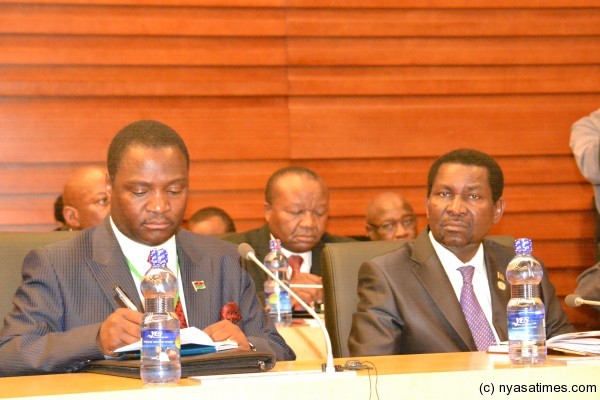 NAC boss Thomas Bisika and Foreign Affairs Minister Mganda Chiume listening attentively.