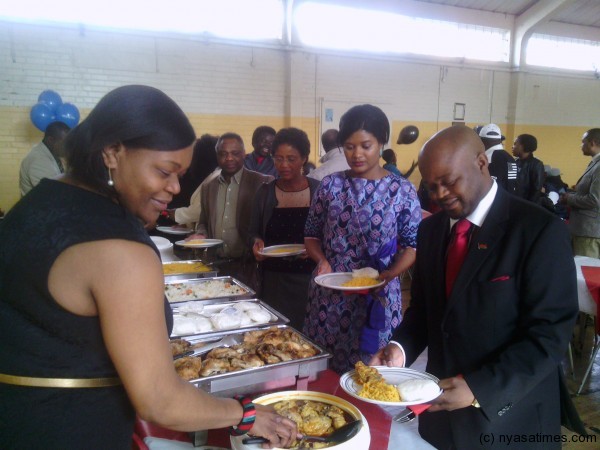 Deputy high commissioner Tembo leads the buffet 