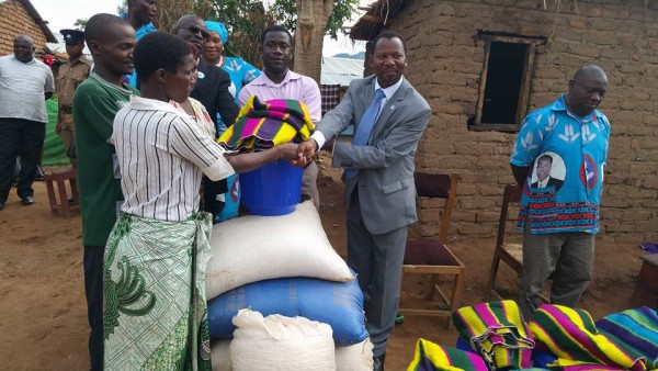 Charles Mhango making maize donation