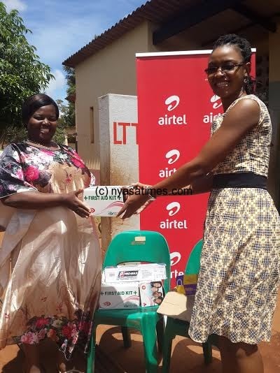 The Official Handover of the Equipment (R) Chavula of Airtel and (L) Majiga of Lilongwe TTC Demonstration School.