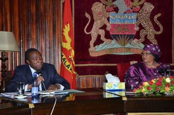 Chikaonda speaking at a Sanjika meeting with President Banda