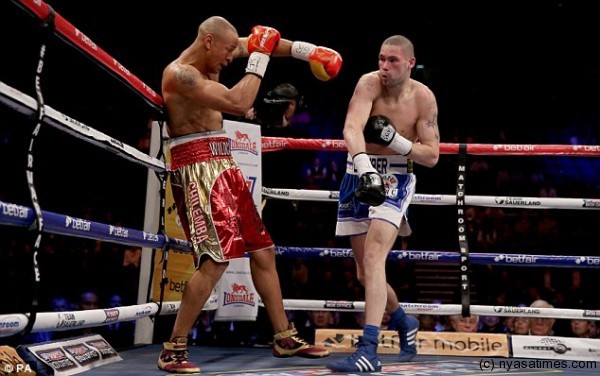 Trading punches: Chilemba and Bellew at O2 Arena.-Photo credit PA