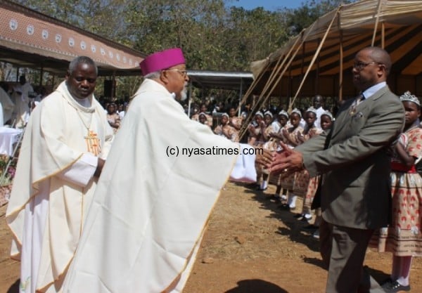 Chilima and Most Rev Berhaneyesus Souraphiel greet each other - Pic by Abel Ikiloni