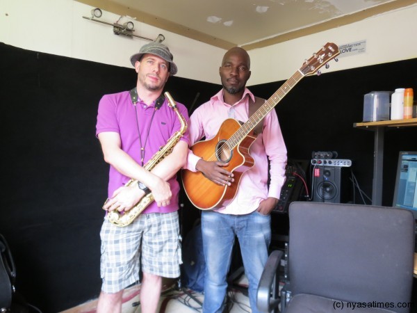 Chris Kele (R) with saxophonist Rick Deja