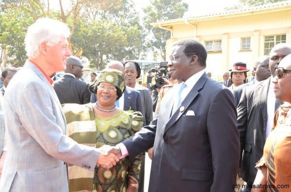 Clinton with First Gentleman, Justice Richard Banda - retired