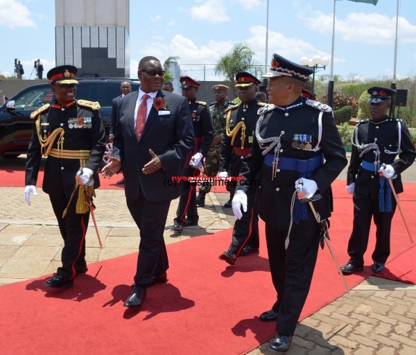 Mutharika accompanied by Malawi Defence Force and Police chiefs on arrival at the Cenotaph
