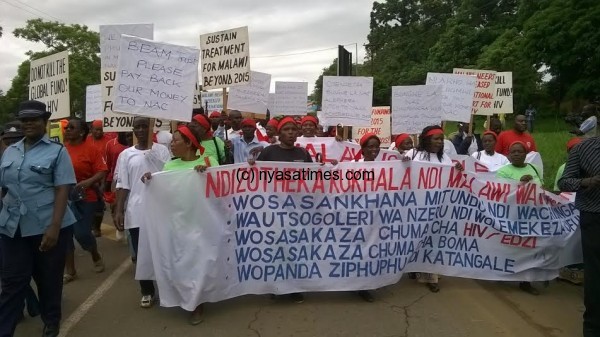 Message is clear! Malawians carrying placards