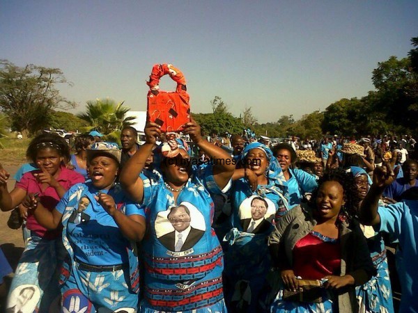 Mutharika's  victory which came late last night brought thousands of people onto the streets to celebrate in a cacophony of car horns, singing and shouting.Here DPP supporter carry a closed lock . Banda's party symbol was open lock