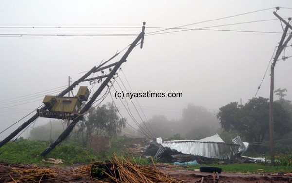 A general view of a collapsed house and broken electrical poles is seen on January 12, 2015 on the outskirts of Malawian capitol, Blantyre Photo: AFP