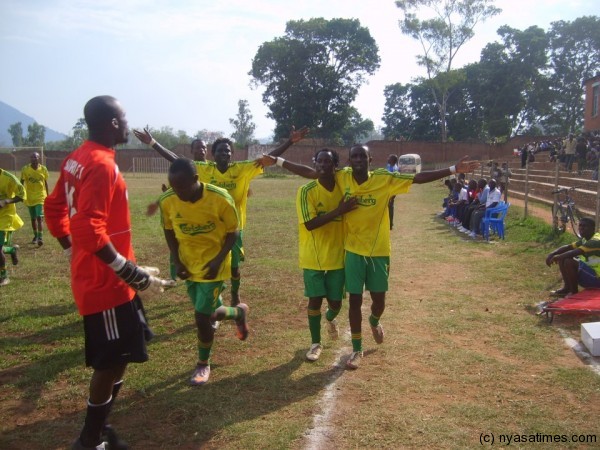 Envirom players celebrate theor goal against Red Lions in Zomba