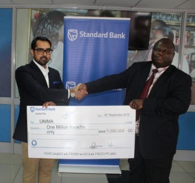 Here you are- Satar handing over a dummy cheque to Kululanga