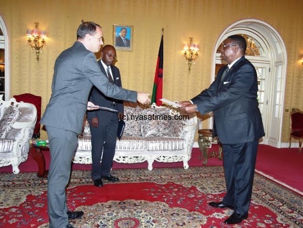Ambassador Marchel Gerrmann presents letters of credentials to President Arthur Peter Mutharika