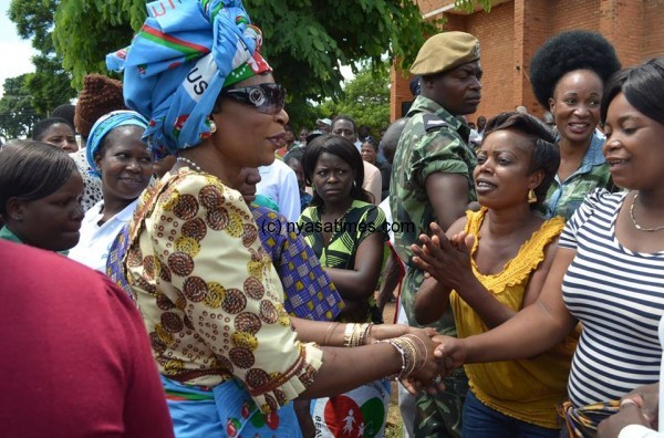 Mrs Muhtarika greets people in Mzuzu