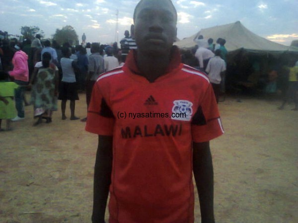 Supporter wearing fake Flames replica jersey