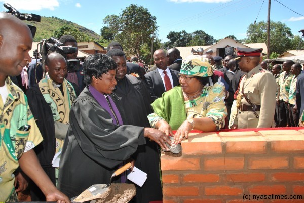 President Banda layinga foundation stone for a CCAP church building in Zomba