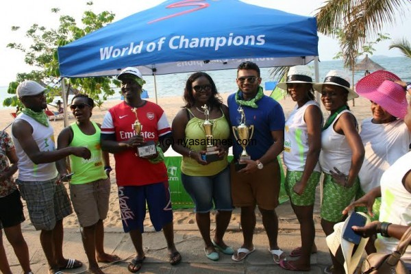TNM officials interacts with golfers after prize presentation