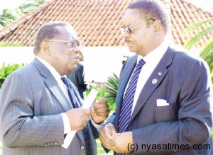 To face treason trial: Goodall Gondwe (L) and Peter Mutharika