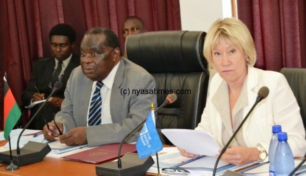 Finance Minister Goodall Gondwe and Ms. Kullenberg, World Bank Country Manager, during the Financing Agreements in LL. - Pic: Abel Ikiloni
