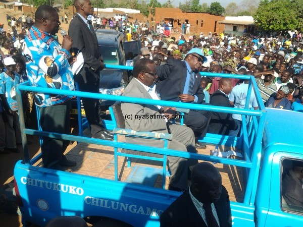 Goodall Gondwe with Peter Mutharika addressing supporters