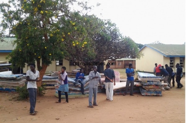 Some students standing before the matresses they returned after the fracas- Pic courtesy of Noel Mkubwi
