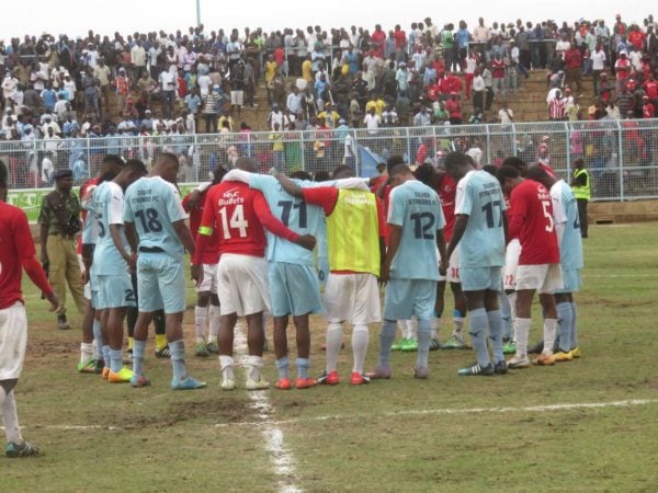 Good sportsmanship- Silver, NBB pray together after the whistle, Pic Alex Mwazalumo