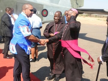 Vice Presidetn Chilima greets the Catholic Bishops on arrival in Karonga from a Donnier