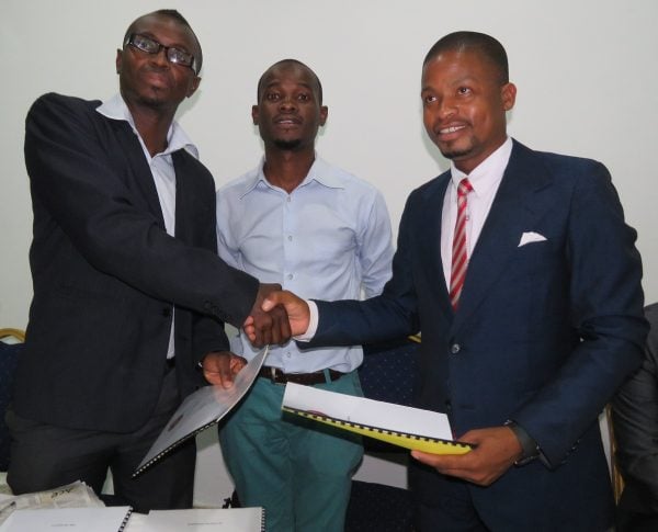 Bullets official Kelvin Moyo receives the sponsorship agreement from Luso TV