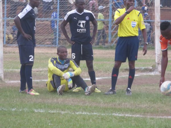 Delaying tactics: Eagles goalkeeper John Soko killing time, Pic Alex Mwazalumo